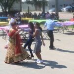 Grand Prairie Foods employees dancing at their summer party